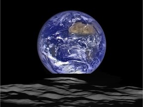 This NASA image released December 18, 2015, shows what  NASA's Lunar Reconnaissance Orbiter (LRO) recently captured in a view of Earth from the spacecraft's vantage point in orbit around the moon. In this composite image we see Earth appear to rise over the lunar horizon from the viewpoint of the spacecraft.