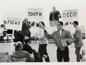 Supporters distribute fluoride toothpaste in 1964.