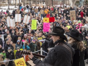 Greg Germscheid of Entwistle and his daughter Becky Hull sing a protest song.   Hundreds of Alberta Farmers and ranchers descended on the Alberta Legislature  to protest against Bill 6, the new farm safety legislation.