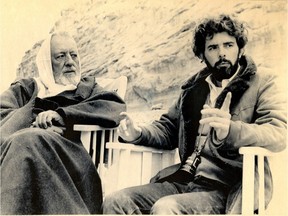 This is a file photo circa 1976 of director George Lucas (right) and actor Alec Guinness on the set of Star Wars in Tunisia.