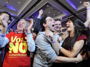 Pro-union supporters celebrate as Scottish independence referendum results are announced at a 'Better Together' event in Glasgow, Scotland, on Sept. 19, 2014.