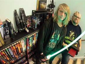Andrew Hibbert, 15, and his father Kolin Hibbert, 45, love the material found in Star Wars' Expanded Universe.