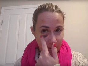 A still from a YouTube video in which a woman describes being the victim of a violent home invasion, days before two Edmonton homicides.