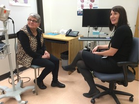 Kidney expert Dr. Ainslie Hildebrand, right, talks with kidney patient Anne Goltz, 70, about the new Glomerulonephritis Clinic at the University of Alberta hospital on Wednesday.