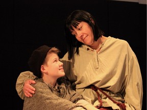 From left, William Pernal (Amahl) and Renee Brad (his mother) rehearsing for Opera Nuova's production of Menotti's opera, Amahl and the Night Visitors.