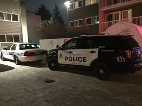 Police vehicles at the scene of a suspicious death at a northeast Edmonton apartment building on Tuesday night.
