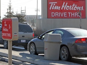 A man received a distracted-driving ticket for using his cellphone while behind the wheel at a Beaumont Tim Hortons drive-thru.