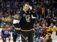 John Scott (28) listens to the cheers as he gets ready to compete in the hardest shot competition at the NHL hockey All-Star game skills competition Saturday, Jan. 30, 2016, in Nashville, Tenn. Scott was elected as captain of the Pacific Division while with the Arizona Coyotes. He was traded to the Montreal Canadiens and he is now with the Canadiens&#039; AHL affiliate in Newfoundland. (AP Photo/Mark Humphrey)