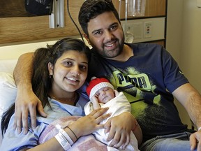 Amanveer and Gurpawandeep Brar are the proud parents of Edmonton's New Year's baby, a girl born at 12:05 a.m. on Jan. 1, 2016, in the Grey Nuns Community Hospital.