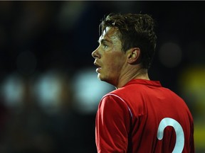 Nik Ledgerwood of Canada looks on during the International Friendly between Canada and Australia at Craven Cottage on Oct. 15, 2013 in London, England. FC Edmonton announced on Jan. 12, 2016, that it has signed Ledgerwood to play for the NASL team.