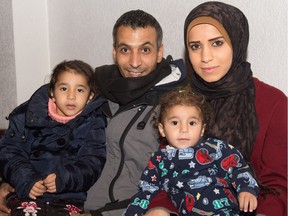 The Dalaa family (left to right) Karima, Iwan, Ayat and Zamzam are living in an apartment in Edmonton. The Syrian refugee family has been sponsored by a group of parishioners affiliated with St. Joseph's College.