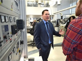 Economic Trade and Development Minister Deron Bilous announces an additional $5 million in program to help small- and medium-sized businesses commercialize products.