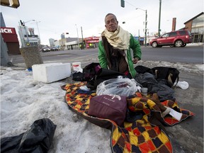 Gregorio Riego gathers his belongings from a downtown street corner. Coun. Scott McKeen wants to use increased tax revenue to fund affordable housing.