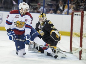 Brandon Baddock of the Edmonton Oil Kings, is unable to score on goalie Jordan Papirny of the Brandon Wheat Kings at Rexall Place in Edmonton.