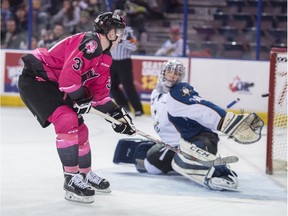 Brett Pollock of the Edmonton Oil Kings scores a short-handed goal on Wyatt Hoflin of the Kootenay Ice during WHL action at Rexall Place on Jan. 31, 2016. The Oil Kings won 6-2.