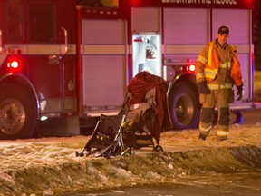 Two strollers at the scene of a car-pedestrian collision on 153rd Avenue near Veterans Way, on Jan. 3, 2016, in Edmonton.