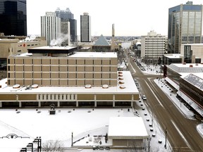 More police are needed on the streets, not a new Stanley A. Milner Library.