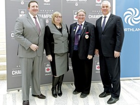 From left, Nortlands president and CEO Tim Reid, Edmonton city councillor Bev Esslinger,  Alberta Curling Federation president Joan Westgard and Ford Motor Co. western region general manager Gerald Wood pose for photos at Edmonton City Hall, where it was announced Jan. 19, 2016, that Edmonton will host the 2017 Ford World Men's Curling Championship at Rexall Place in Edmonton.