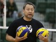 University of Alberta Pandas associate coach Naoki Miyashita helps out at the New Year's Classic women's volleyball tournament at the Saville Community Sports Centre on Jan. 3, 2016.