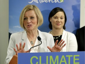 Alberta Premier Rachel Notley, left, and Environment Minister Shannon Phillips release details about the province's climate change plan at the Telus World of Science on Nov. 22, 2015.