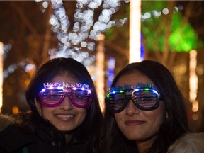 Biana Amin, left, and Shweta Pipaliya at the New Year's celebrations in Sir Winston Churchill Square in Edmonton, Dec. 31, 2015