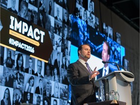 Brad Ferguson, president and chief executive at Edmonton Economic Development Corp., addresses business community during the Impact luncheon Tuesday.