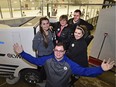 Minor Hockey Week volunteers the Mayer family: mom Angie Mayer, centre, surrounded by siblings Jason, back, Melanie, left, Bryce, front, and Jason's wife Jodi at Millwoods Arena in Edmonton, Jan. 15, 2016.