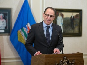 Finance Minister Joe Ceci speaks to reporters at Government House in Edmonton on Jan.18, 2016. Moody's has kept Alberta's credit rating at AAA but has changed the province's outlook from stable to negative.
