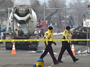 A 49-year-old woman was struck and killed Friday morning by a cement truck at 107th Street and 103rd Avenue.