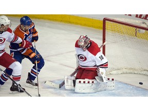 EDMONTON, ALTA: ¬†JANUARY 4, 2016 -- Andrej Sekera (2) scores with Jordan Eberle (14) in front of the net as the Edmonton Oilers beat the Hurricains 1-0 in overtime  in Edmonton, January 4, 2016.