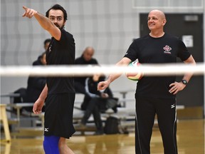 Head coach Glenn Hoag and his son Nicholas Hoag of Canada's National Men's volleyball team take part in a practice Jan. 5, 2016 in Edmonton in preparation for a four-team tournament Jan. 8-10. An Olympic berth for the 2016 Games in Rio de Janeiro is on the line at the Edmonton tournament.