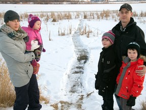 The Tomlinsons: Morgann; Taiya 3;  Tysen, 10;  Tristen, 7; and Brian. Morgann Tomlinson is upset her family received a ticket New Year's Eve after her husband flooded a rink on Popular Lake behind their Klarvatten home. She and her three kids were going to use the rink.