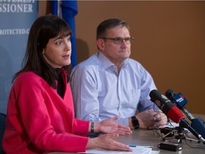 Jill Clayton, left, the Information and Privacy Commissioner, and Peter Hourihan, the Public Interest Commissioner, during a news conference in Edmonton on May 13, 2015 to discuss the results of their joint investigation into the alleged improper destruction of records after the May 5 provincial election.
