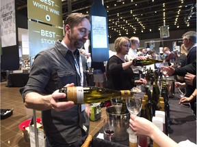 Winemaker Paul Pender from Tawse Winery pouring at the Northern Lands Great Canadian Wine and Craft Beer Festival at the Shaw Conference Centre in Edmonton, March 28, 2015.