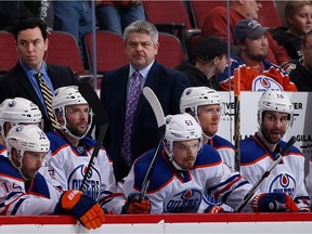 GLENDALE, AZ - Oilers head coach Todd McLellan watches from the bench during the third period of the NHL game against the Arizona Coyotes at Gila River Arena on Jan. 12, 2016 in Glendale, Arizona. The Coyotes defeated the Oilers 4-3 in overtime.