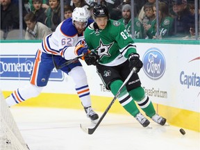 Ales Hemsky of the Dallas Stars skates the puck against Eric Gryba of the Edmonton Oilers in the first period at American Airlines Center on January 21, 2016 in Dallas.
