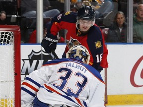 Aleksander Barkov (16) of the Florida Panthers has his shot blocked by Oilers goaltender Cam Talbot (33) during the first period of the game on Jan. 18, 2016, in Sunrise, Florida.
