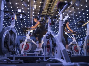 YEG Cycle, a new boutique spin cycle studio on Whyte Avenue. The  studio emphasizes pack training, choreography and a lights-based show. Farha Shariff, an instructor and co-owner who's also a U of A adjunct prof and mother of three.