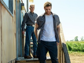 Actors Billy Bob Thornton, left, and Liam Hemsworth in a scene from the dramatic feature film Cut Bank, which was filmed in Edmonton and Innisfree in 2013.