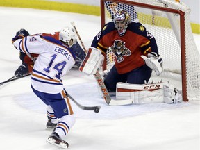 Edmonton Oilers right wing Jordan Eberle (14) shoots for a goal against Florida Panthers goalie Al Montoya (35) during the first period of an NHL hockey game, Monday, Jan. 18, 2016, in Sunrise, Fla.