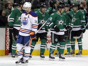 Edmonton right-winger Jordan Ebrle (14) skates back to the bench after a goal by Dallas Stars defenceman Jyrki Jokipakka during the Stars' 3-2 NHL win over the Oilers in Dallas on Thursday, Jan. 21, 2016.