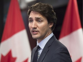 Prime Minister Justin Trudeau talks with reporters in Davos, Switzerland on Friday, Jan. 22, 2016. The Prime Minister is attending the World Economic Forum where political, business and social leaders gather to discuss items of global and regional importance.