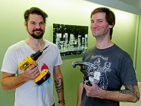 Mark Muz, left, and his brother Philip Muz begin renovations to their planned cafe/venue, The Aviary, on Norwood Boulevard.