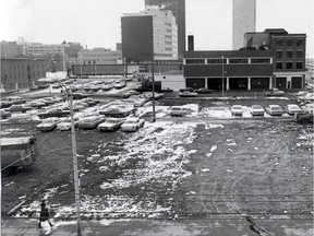 The site of the courthouse was a parking lot in 1969, prior to construction of the Law Courts in 1972.