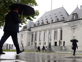 The Supreme Court of Canada grappled with the issue of doctor-assisted dying on Monday, hearing a request from the government for more time to draft new rules.