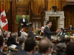 Prime Minister Justin Trudeau answers a question during question period in the House of Commons on Parliament Hill in Ottawa, on Wednesday, Dec. 9, 2015.