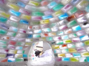 A shot from inside the cathedral glass-coloured igloo built in Edmonton.