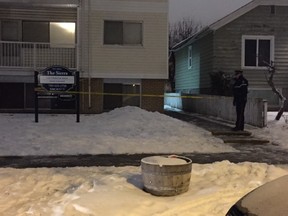 Police cordoned off an apartment building at 10745 106 St. on Dec. 12, 2015. Yvette Lydia Morin, 28, died of a gunshot wound there.