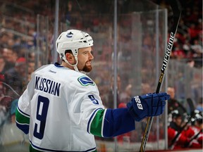 Zack Kassian, pictured celebrating a goal against the New Jersey Devils in February 2015 when he played for the Vancouver Canucks, will get his chance to play with the Oilers. Edmonton recalled Kassian from the Bakersfield Condors on Jan. 13, 2016.