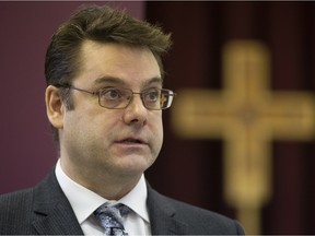 Dr. Matt Meeuwissen discusses proposals to legalize physician-assisted death during a press conference Thursday at the Catholic Archdiocese of Edmonton, 8421 101 Ave.